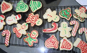 Snowmen, bells, and candy cane sugar cookies.